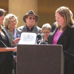 Angela Motta of Councilmember Eric Garcetti’s office presents CHANGE coalition members with a Certificate of Appreciation