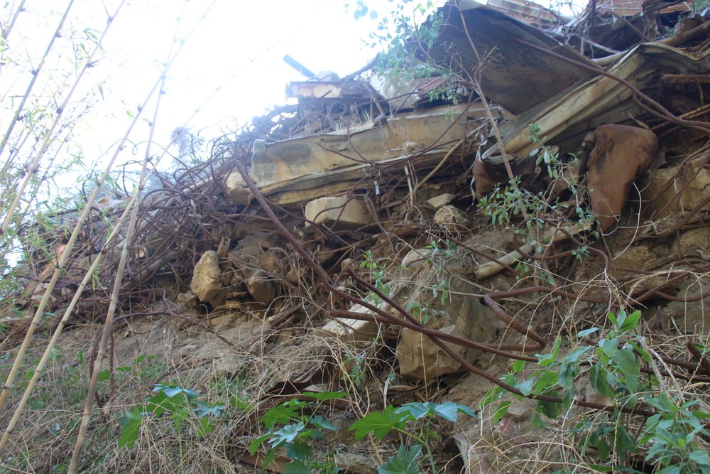 Tons of rubble in West LA VA's arroyo bordering biomedical nuclear dump