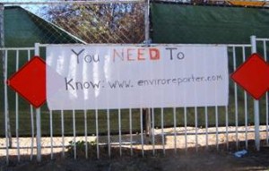 EnviroReporter sign on fence at Runkle Canyon