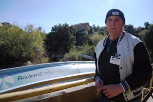 Lewis MacAdams next to Rocketdyne boat-WPB