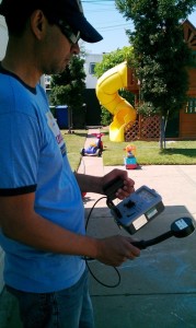 Hector Vazquez measures background radiation in East Los Angeles