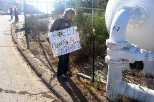 "Wild Bill" Bowling discovers possible antimony contamination at August 6, 2016 Rocketdyne Cleanup Coalition protest at SSFL entrance.